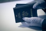 Person having American passport for inspection